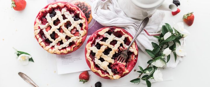 baked pie near white ceramic teapot